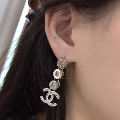 Boucles d'oreilles tendance avec pendentif lettre