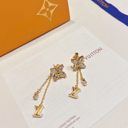 Boucles d'oreilles réversibles avec pendentifs floraux en cristal