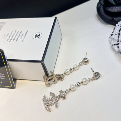 Boucles d'oreilles pendantes longues Perle de Cristal