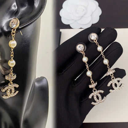 Boucles d'oreilles pendantes longues Perle de Cristal