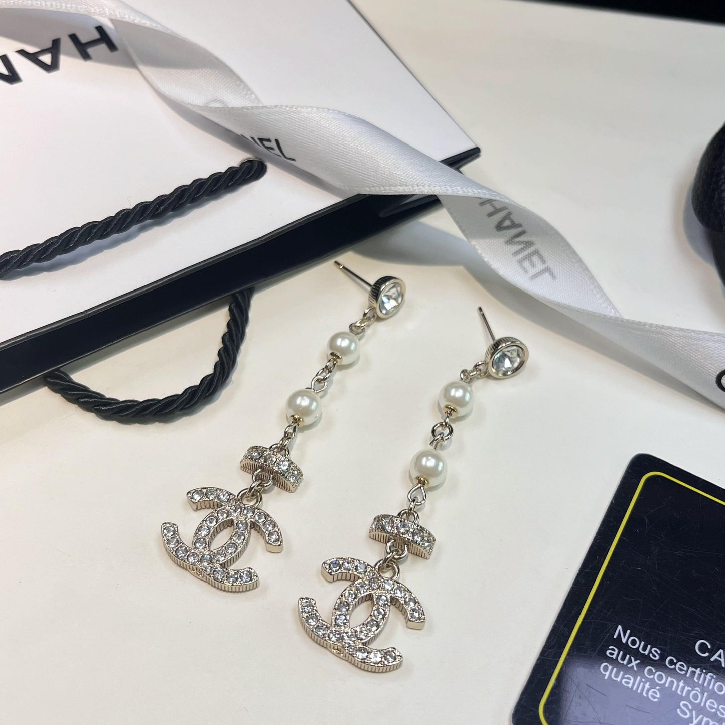 Boucles d'oreilles pendantes longues Perle de Cristal