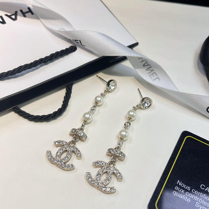 Boucles d'oreilles pendantes longues Perle de Cristal