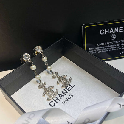 Boucles d'oreilles pendantes longues Perle de Cristal