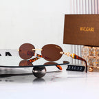 Luxury Rimless Wave Cut Oval Sunglasses - 51032