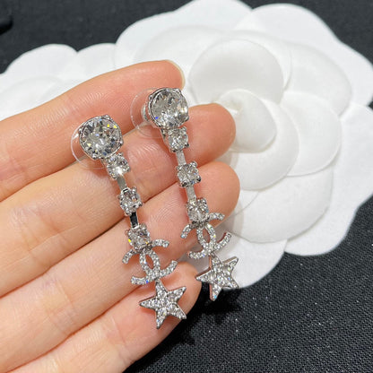 Boucles d'oreilles longues Étoile de Cristal