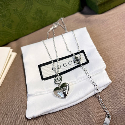 Collier pendentif amour 2 couleurs