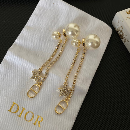 Boucles d'oreilles étoiles en métal finition dorée avec perles