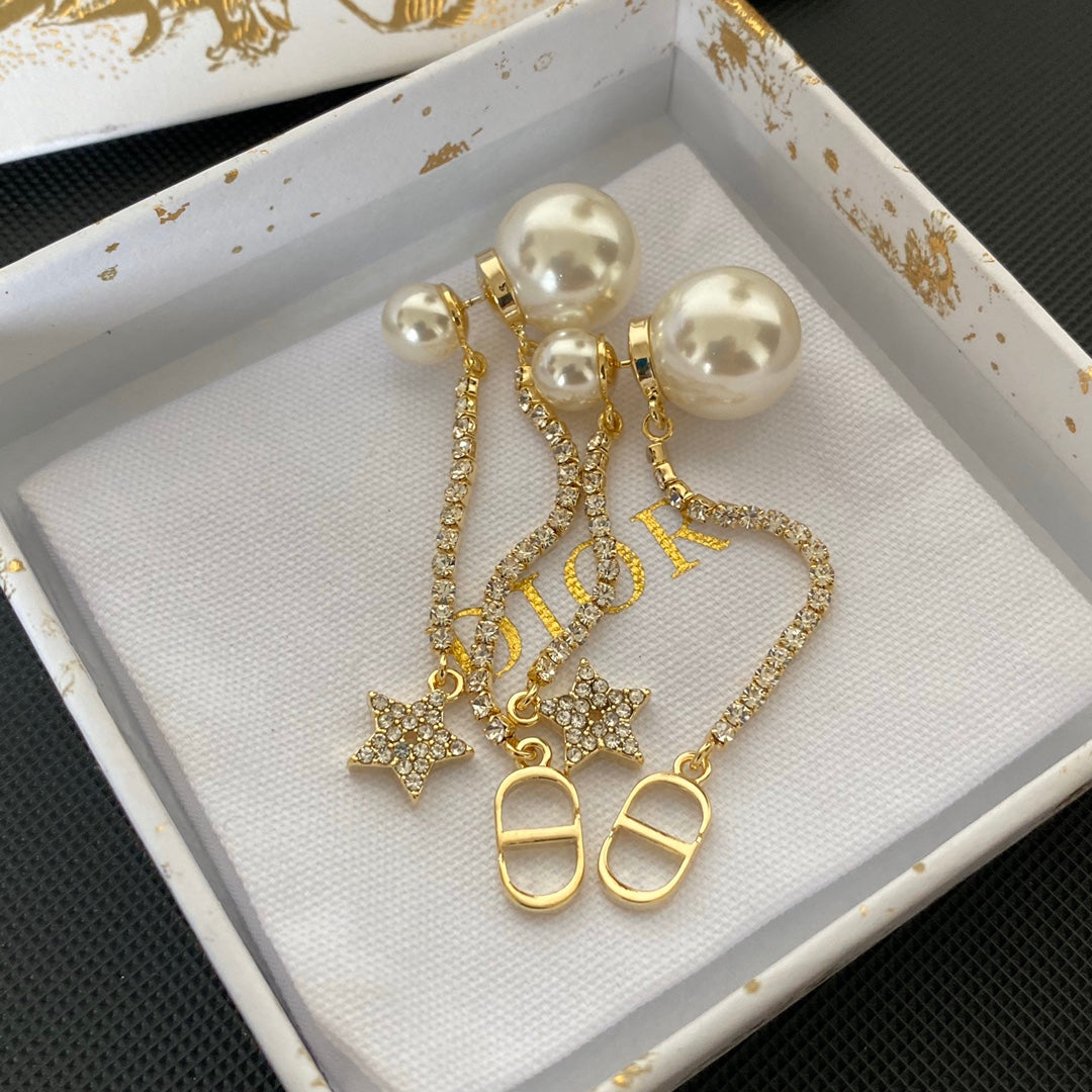 Boucles d'oreilles étoiles en métal finition dorée avec perles