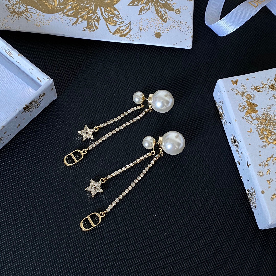 Boucles d'oreilles étoiles en métal finition dorée avec perles