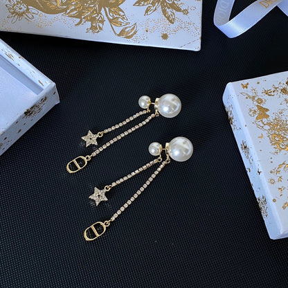 Boucles d'oreilles étoiles en métal finition dorée avec perles