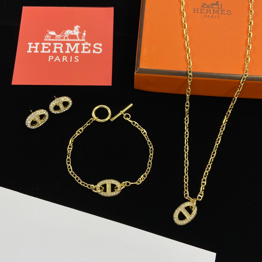 Juego de joyas de oro con logotipo de farándula clásico