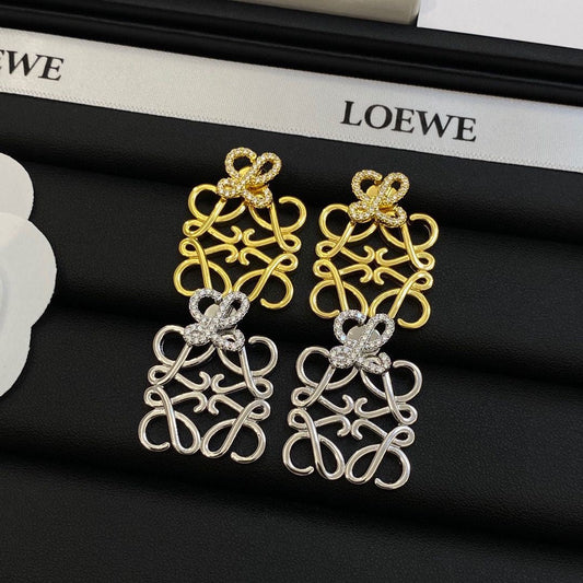 Pendientes de diamante con logo vintage