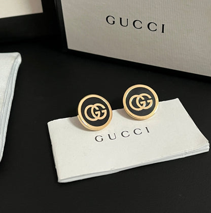 Boucles d'oreilles G élégantes et simples