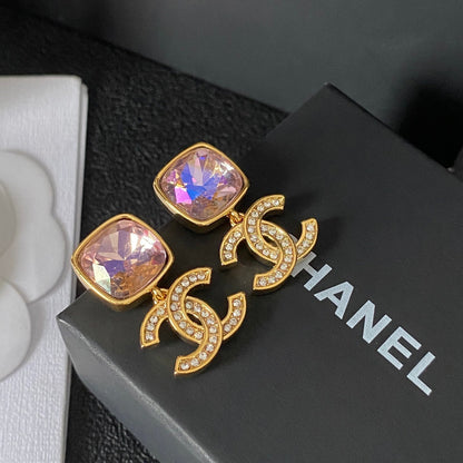 Boucles d'oreilles pendantes élégantes en pierres précieuses