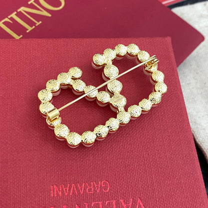 Broche V perle élégante
