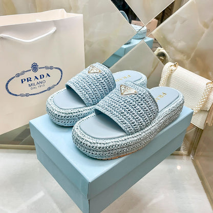 Pantuflas con logotipo de triángulo tejido