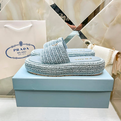 Pantuflas con logotipo de triángulo tejido