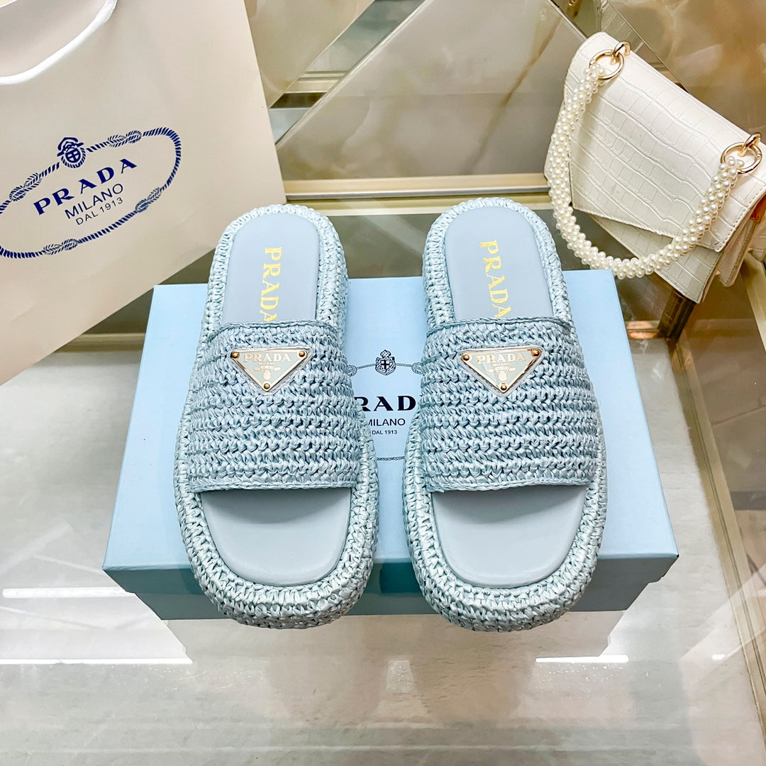 Pantuflas con logotipo de triángulo tejido