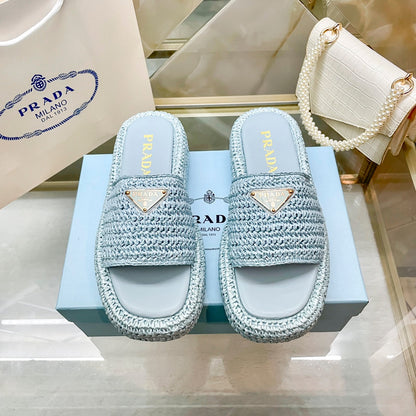 Pantuflas con logotipo de triángulo tejido