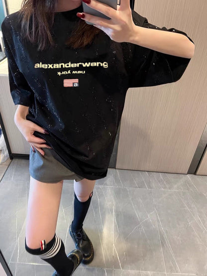 T-shirt à manches courtes avec logo brodé en mousse étincelante étoilée.