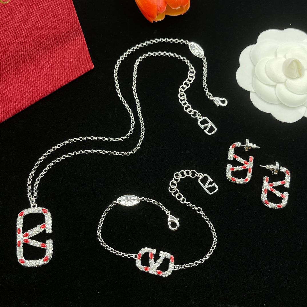 Juego de joyas con logotipo de diamante de plata vintage