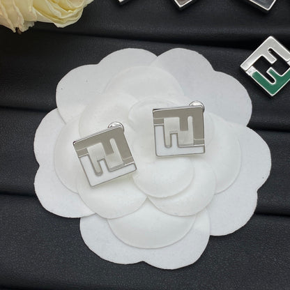 Boucles d'oreilles en argent émaillé en forme de F