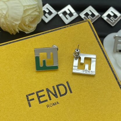 Boucles d'oreilles en argent émaillé en forme de F