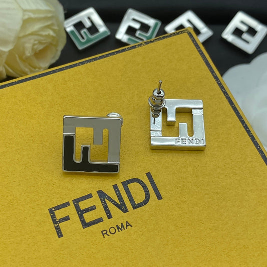 Boucles d'oreilles en argent émaillé en forme de F