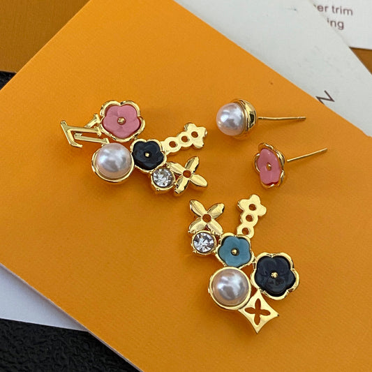 Aretes de moda asimétricos florales