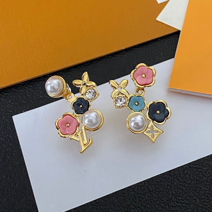 Aretes de moda asimétricos florales