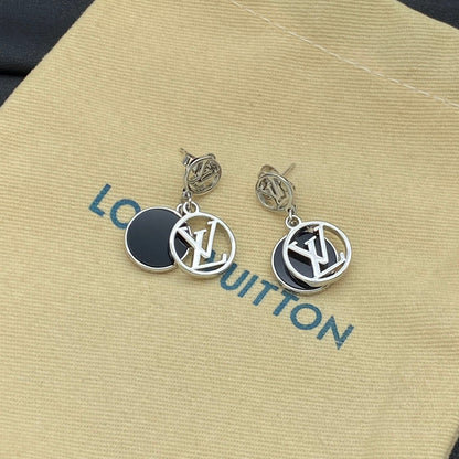 Boucles d'oreilles en métal avec pendentif rond siglé