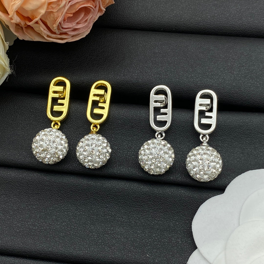 Boucles d'oreilles pendantes boule de cristal en métal
