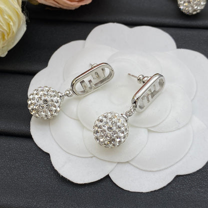 Boucles d'oreilles pendantes boule de cristal en métal