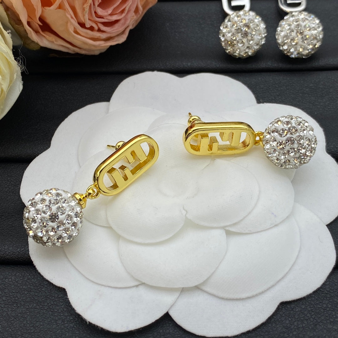 Boucles d'oreilles pendantes boule de cristal en métal