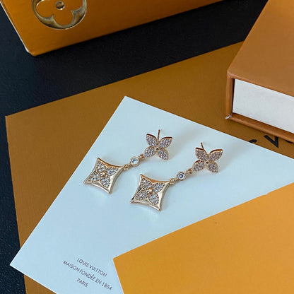 Boucles d'oreilles trèfle à quatre feuilles en diamant à la mode