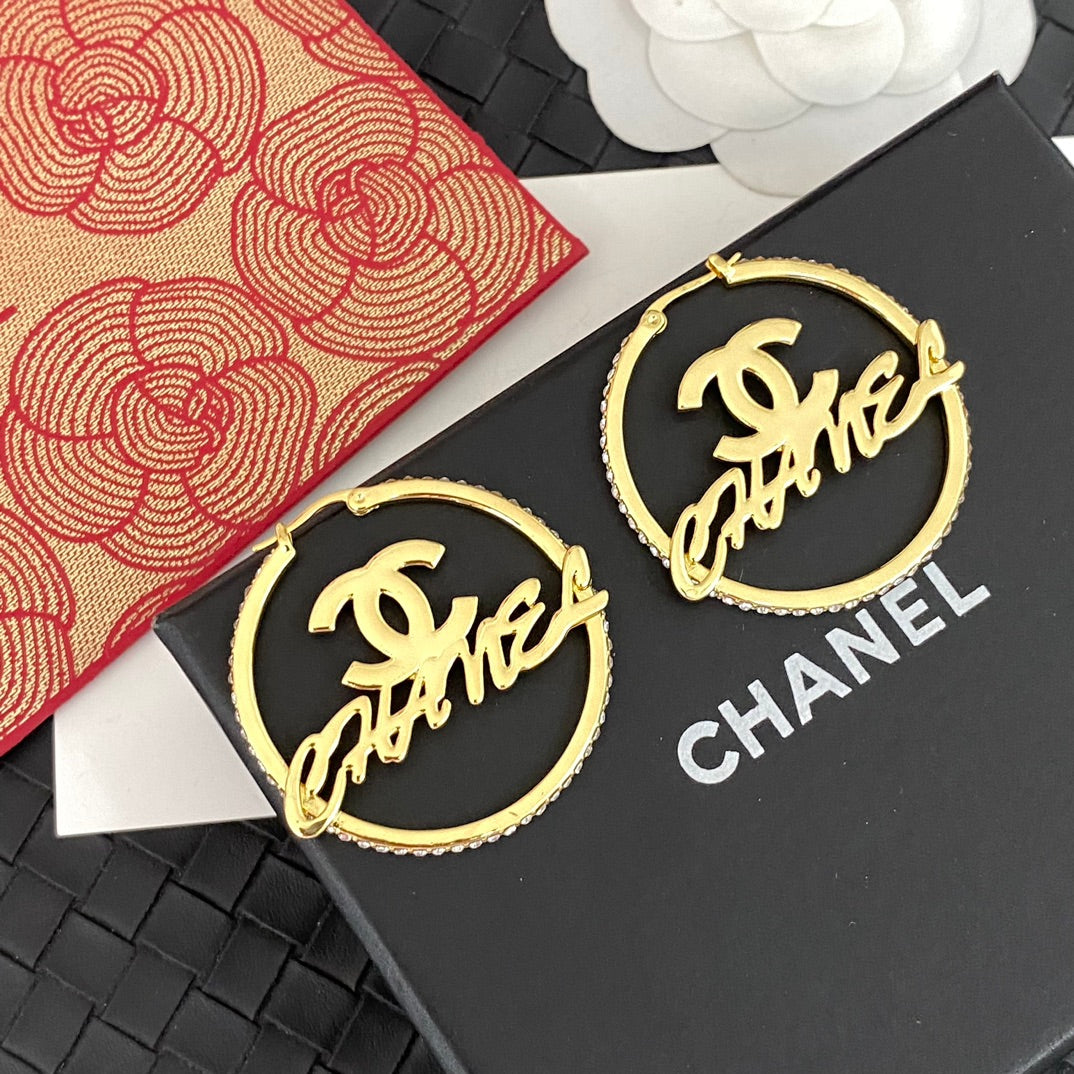 Boucles d'oreilles créoles lettres creuses