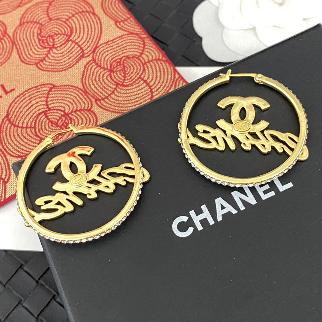 Boucles d'oreilles créoles lettres creuses