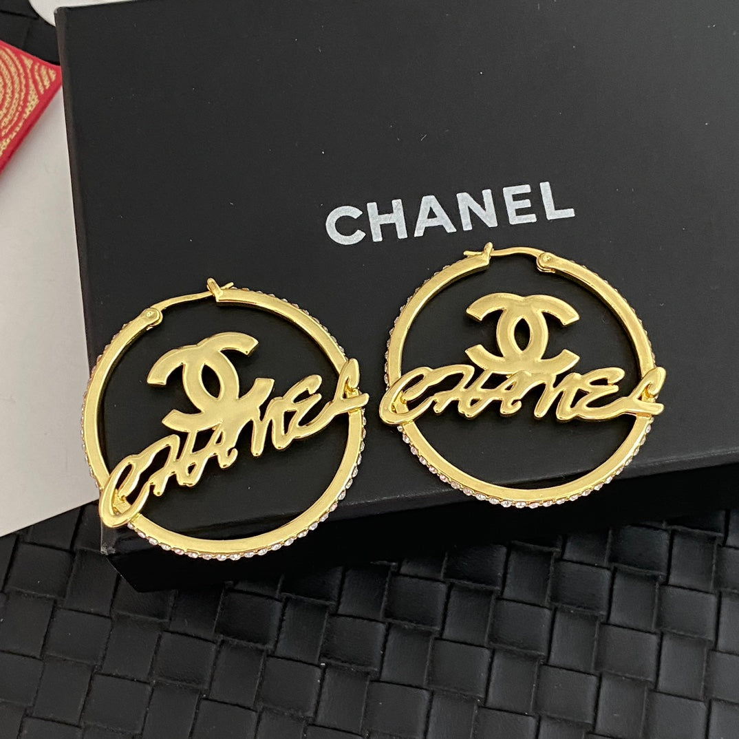 Boucles d'oreilles créoles lettres creuses