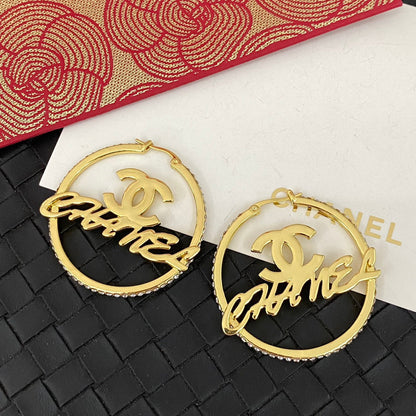 Boucles d'oreilles créoles lettres creuses