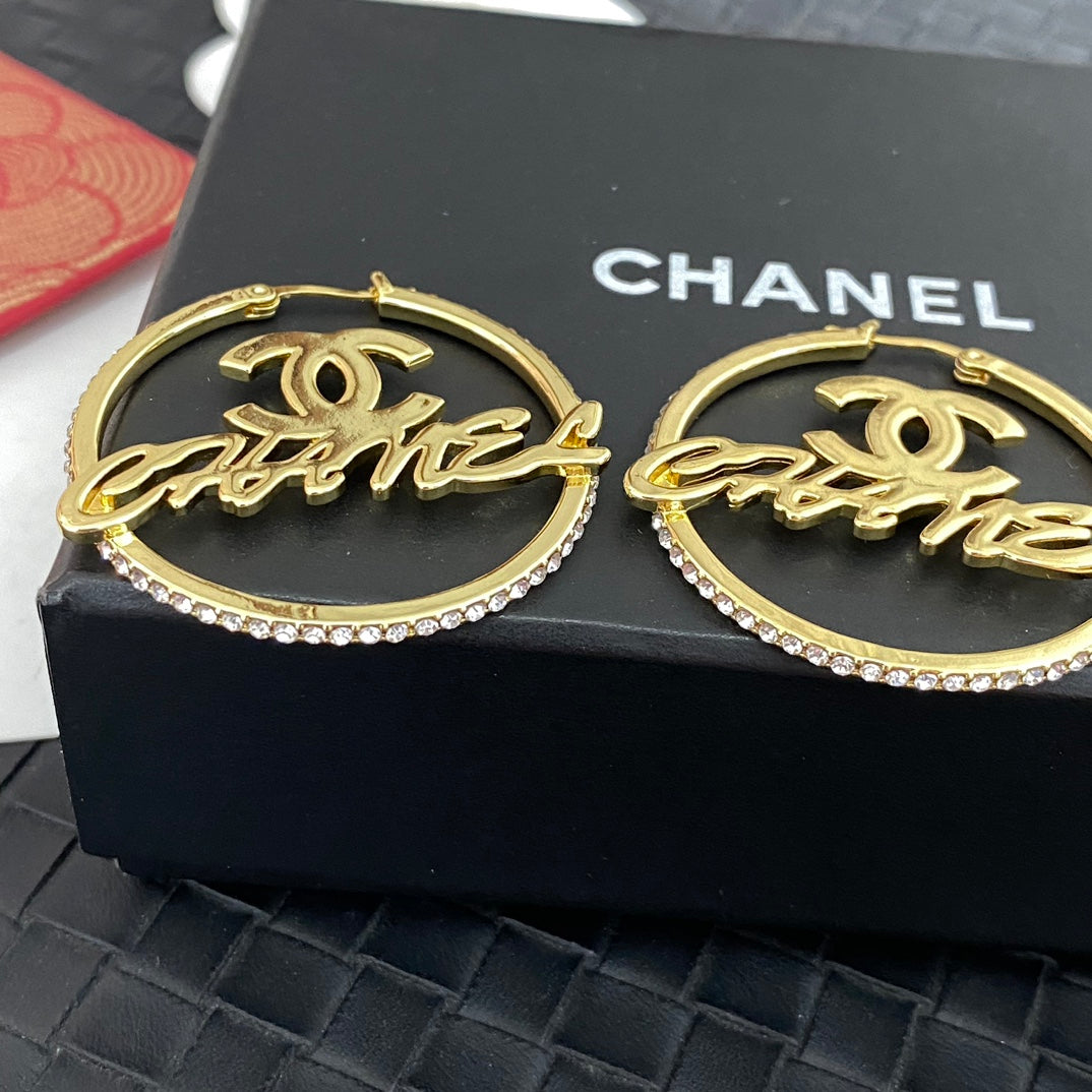 Boucles d'oreilles créoles lettres creuses