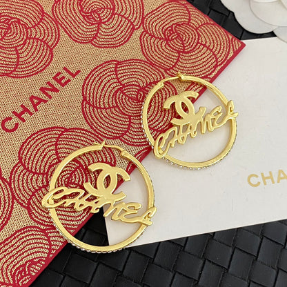 Boucles d'oreilles créoles lettres creuses