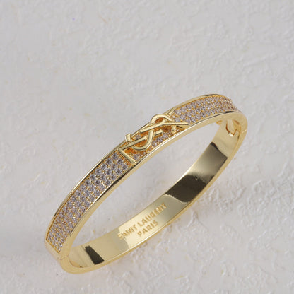 Jonc métallique avec logo en forme de diamant