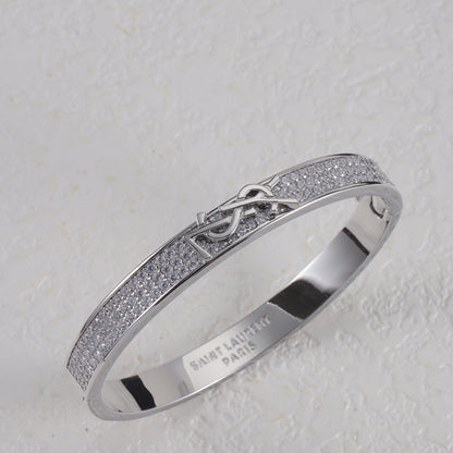 Jonc métallique avec logo en forme de diamant