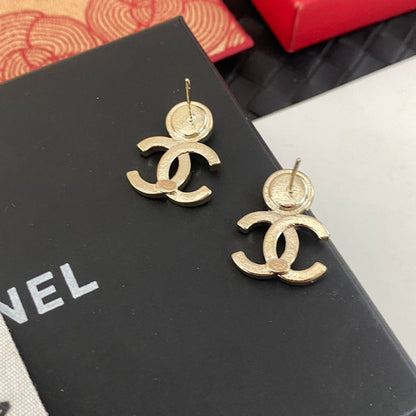 Boucles d'oreilles en strass roses