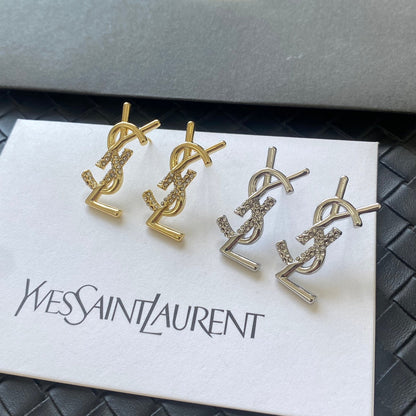 Boucles d'oreilles en métal avec logo diamant