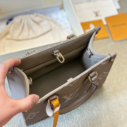 Bolso tote Onthego de cuero gris repujado