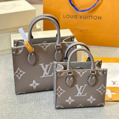 Bolso tote Onthego de cuero gris repujado