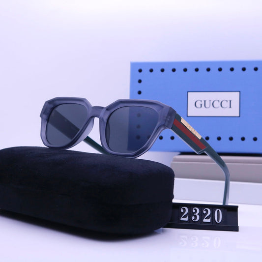 Gafas de sol de moda con patillas a rayas