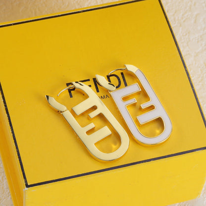 Boucles d'oreilles ovales émaillées en métal doré