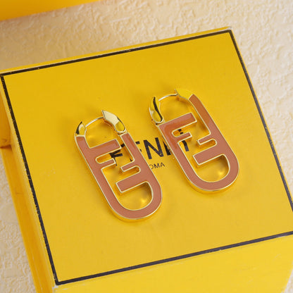 Boucles d'oreilles ovales émaillées en métal doré